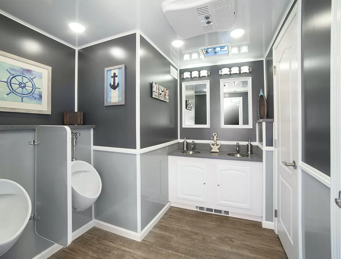Restroom trailer rental—clean, modern exterior with entry steps and non-slip platforms.