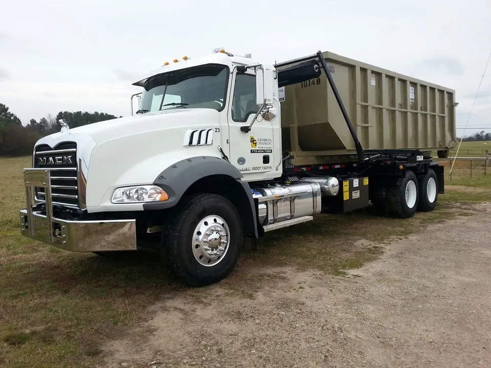 Commercial roll-off dumpster with reinforced sides for high-volume hauling.
