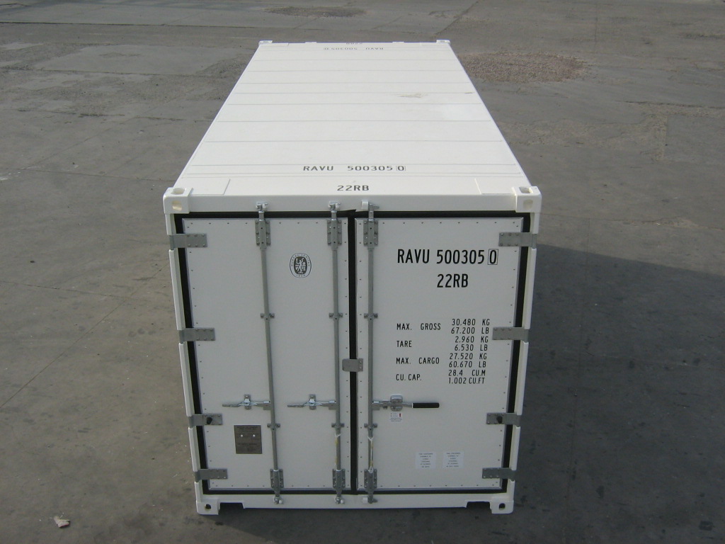 20-foot steel storage container rental with lockable double doors on an active construction site.