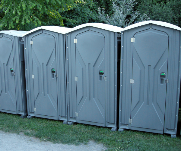 Sturdy portable toilet cabinet suitable for construction and event rentals.
