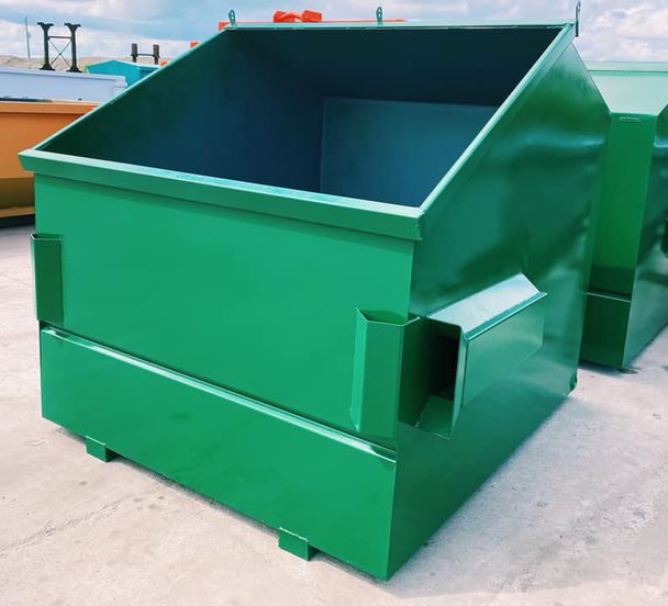 Side view of a front-load dumpster with reinforced lids for routine commercial trash service.